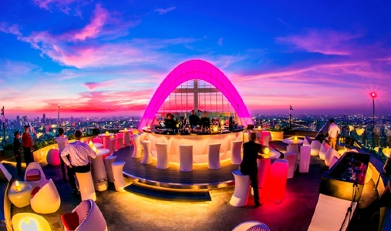 Enjoy exclusive champagne with a sky-high view and a gourmet snack menu at CRU Champagne Bar at Red Sky